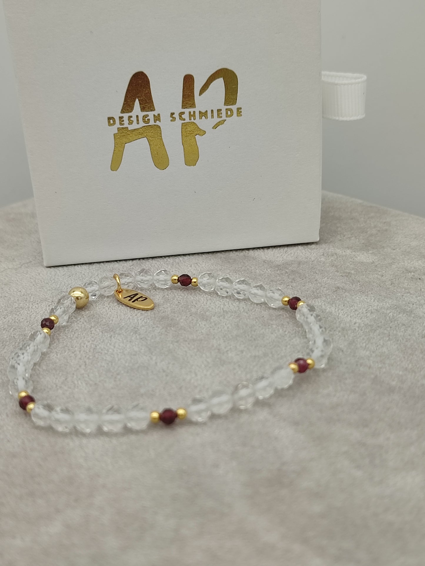 Bergkristall / Granat Armband (Löwe)